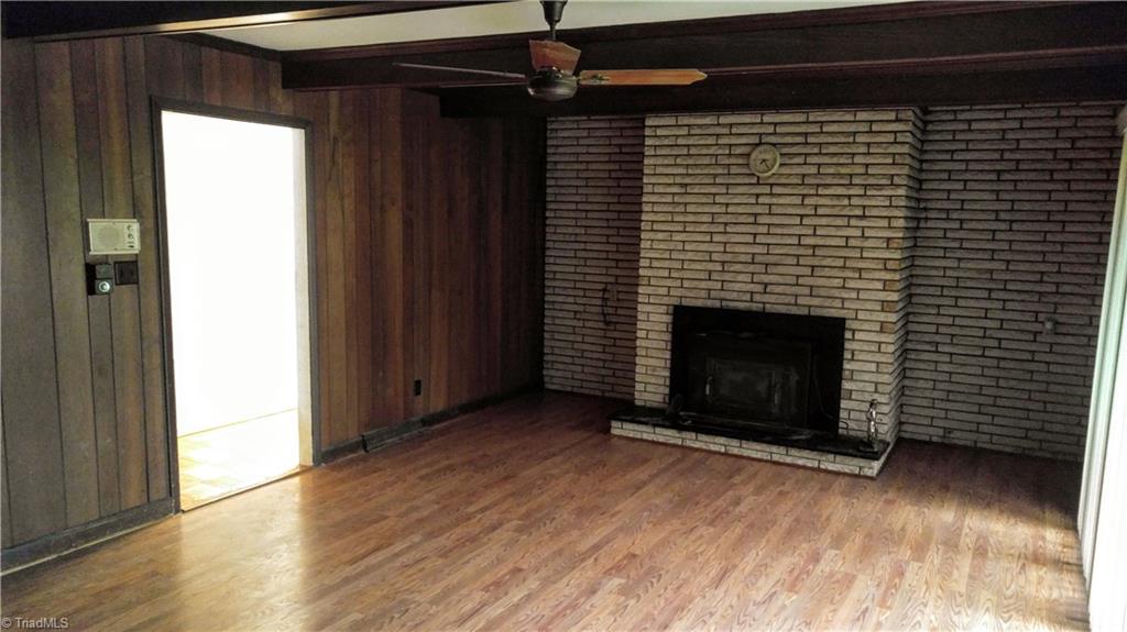 1754 Jackson Lake Road High Point, NC 27263 - Photo 12 of 30 Den with built in shelves and fireplace
