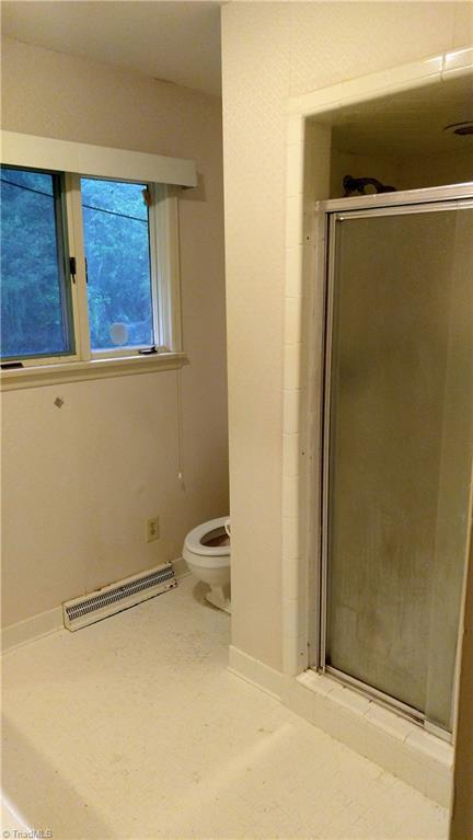 1754 Jackson Lake Road High Point, NC 27263 - Photo 18 of 30 Master bathroom with tub and stall shower