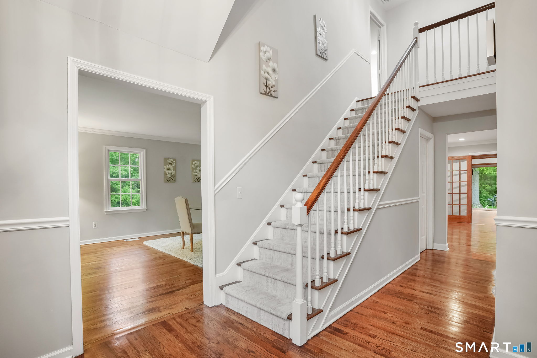 22 Fox Run Wilton, CT 06897 - Photo 11 of 40 a view of entryway and hall with wooden floor