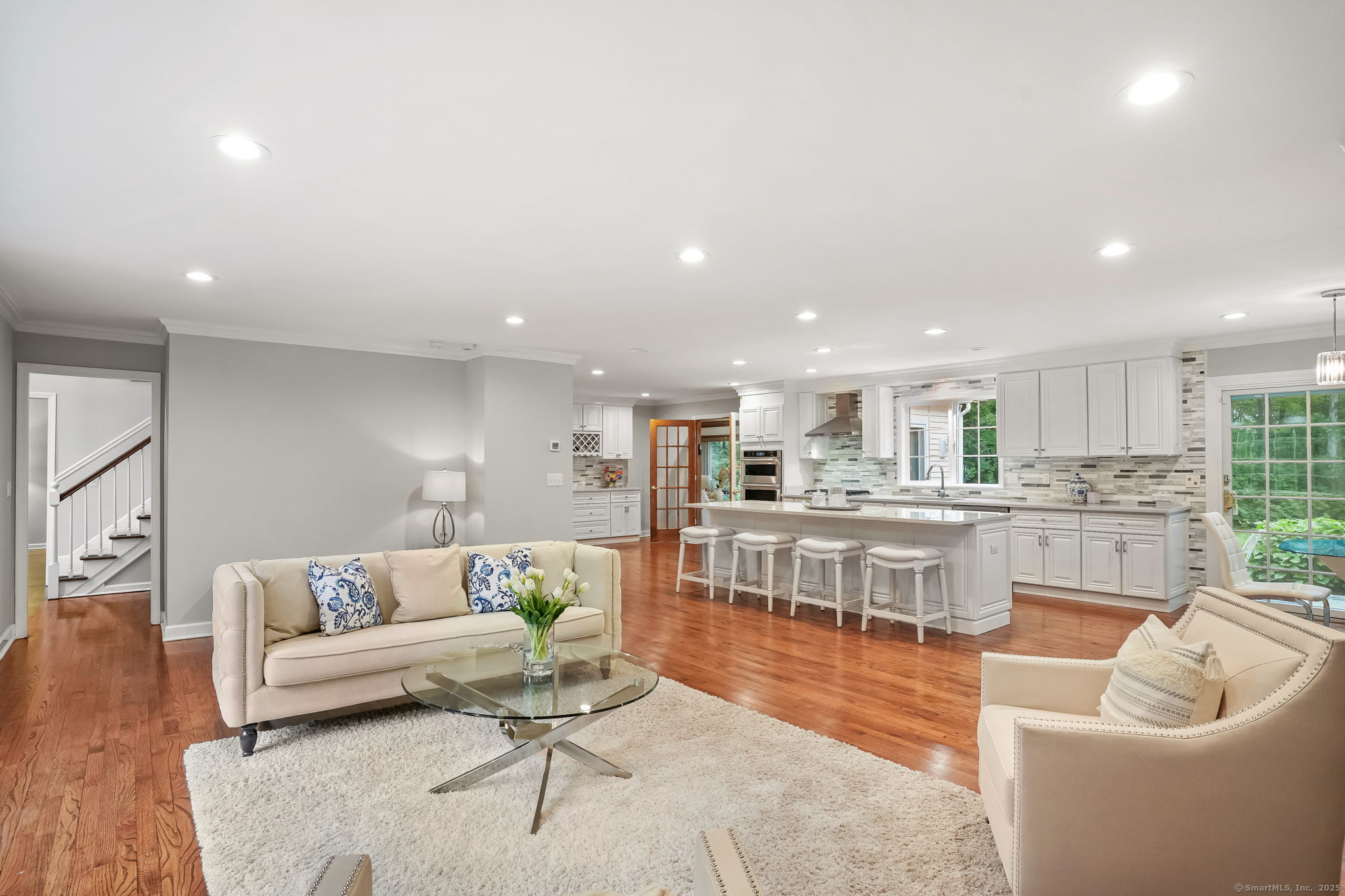 22 Fox Run Wilton, CT 06897 - Photo 13 of 40 a living room with furniture and a view of kitchen