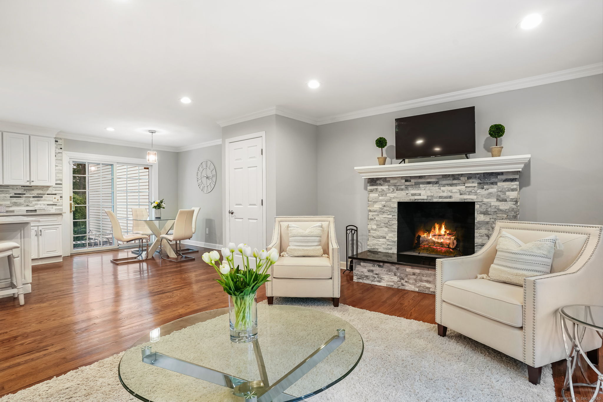 22 Fox Run Wilton, CT 06897 - Photo 15 of 40 a living room with furniture and a fireplace