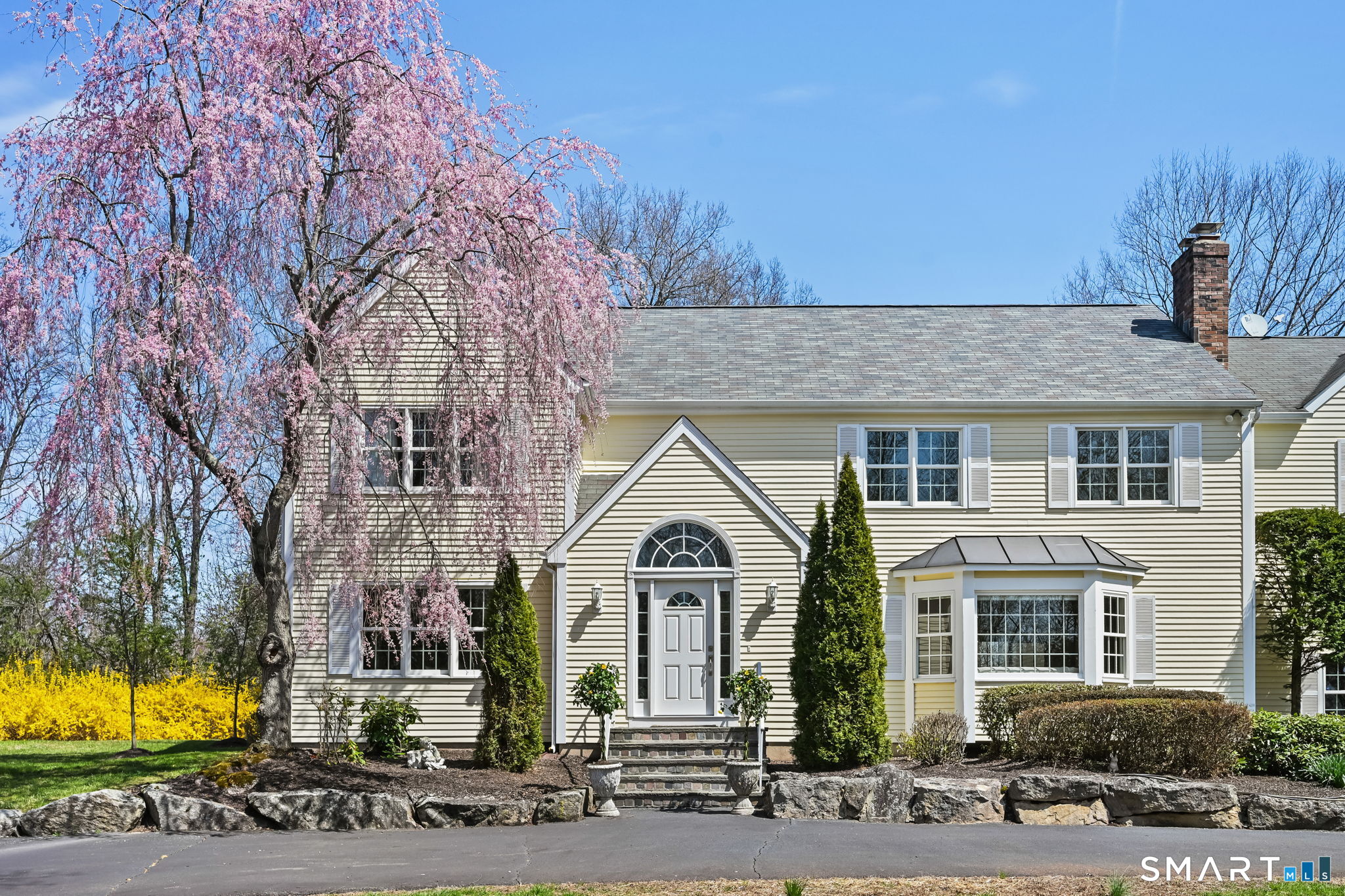 22 Fox Run Wilton, CT 06897 - Photo 2 of 40 a view of multiple houses with a street