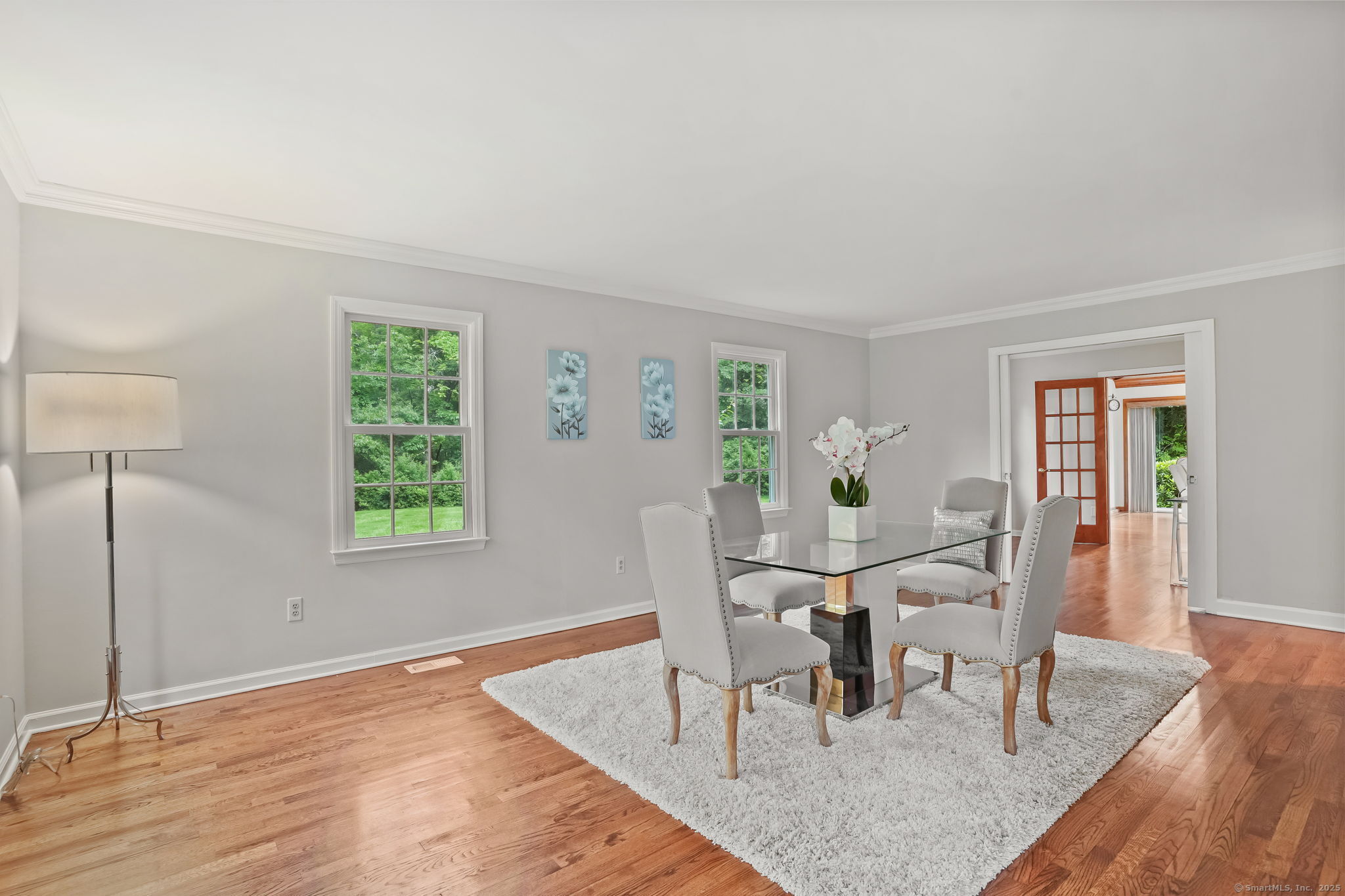 22 Fox Run Wilton, CT 06897 - Photo 25 of 40 a view of a dining room with furniture and wooden floor