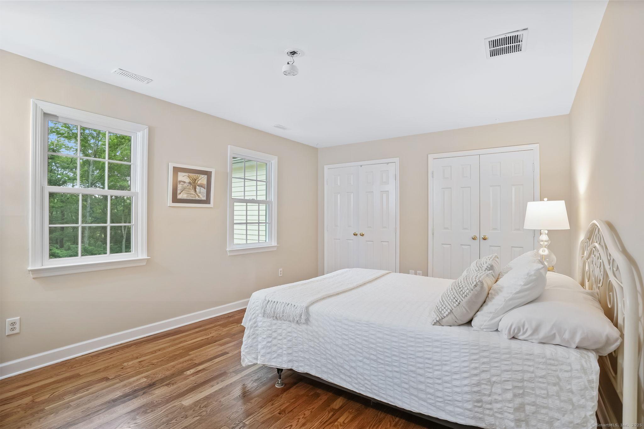 22 Fox Run Wilton, CT 06897 - Photo 27 of 40 a bedroom with a bed and a window