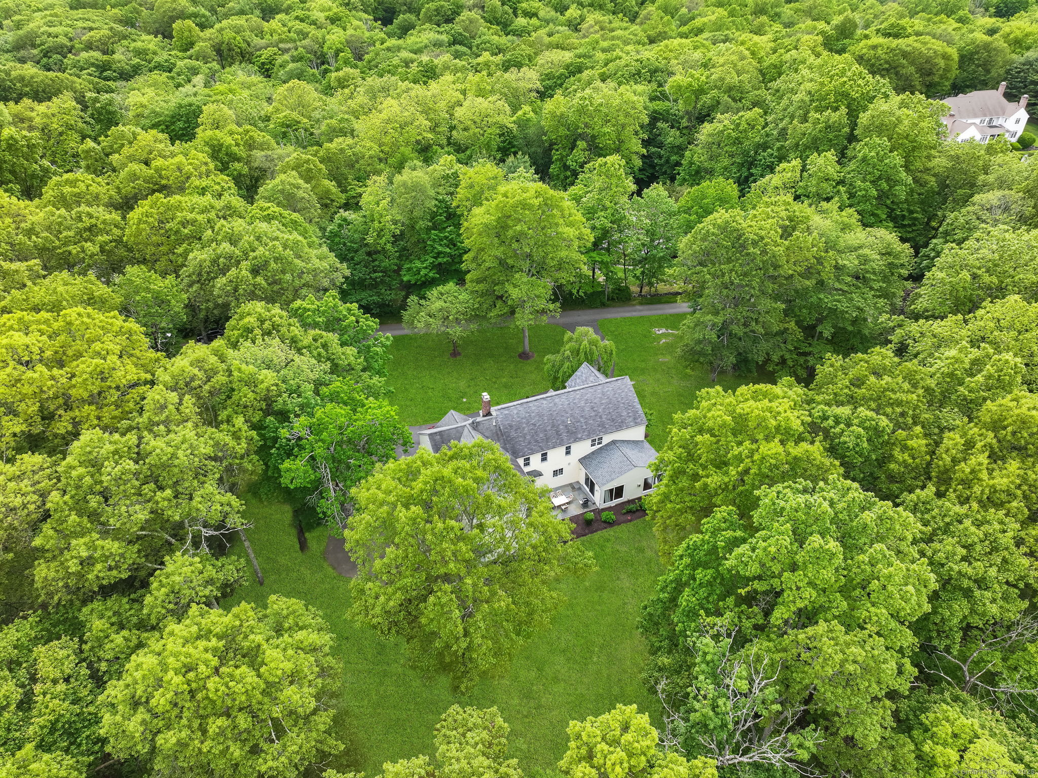 22 Fox Run Wilton, CT 06897 - Photo 3 of 40 a aerial view of a house with a yard