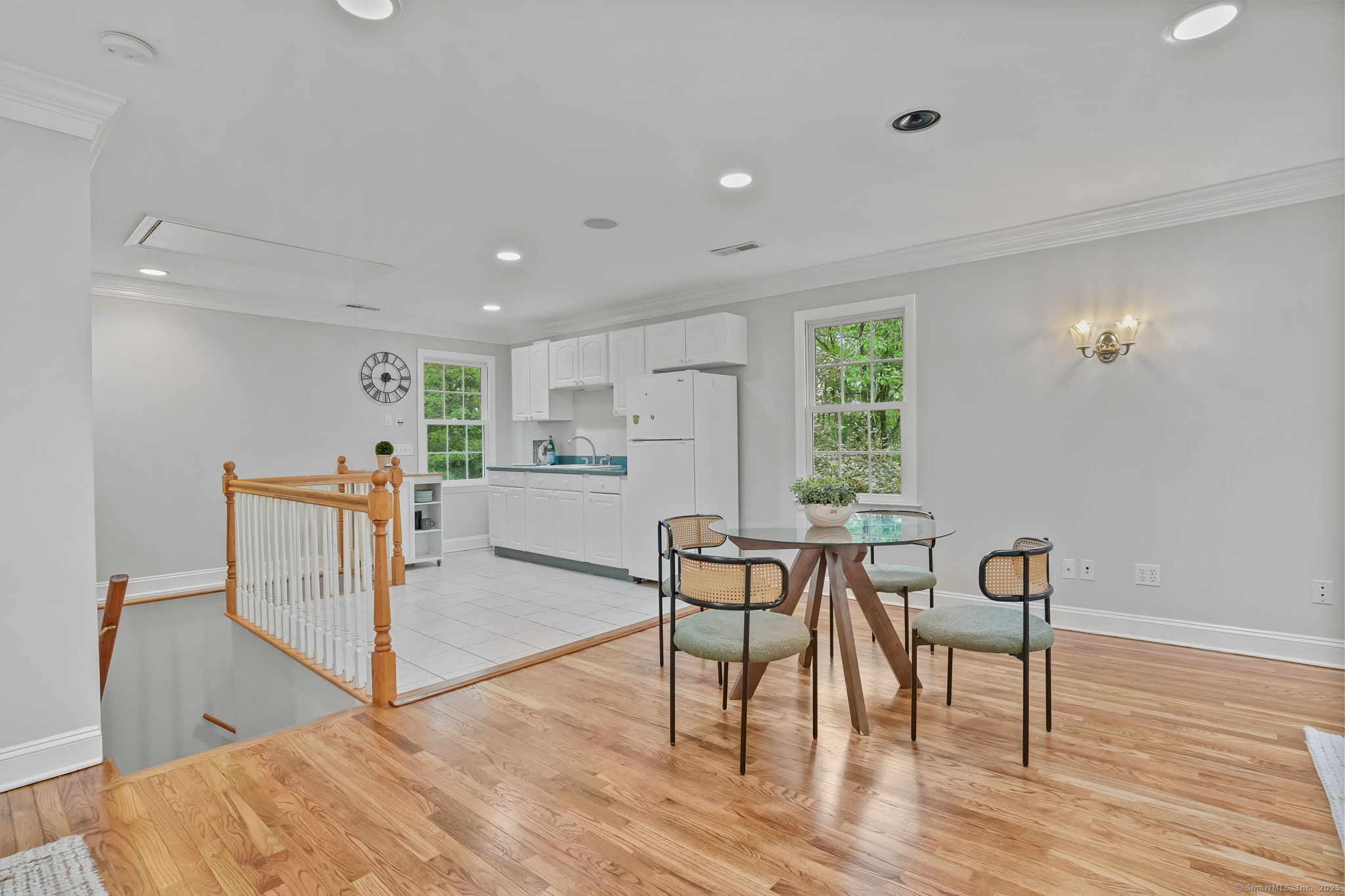 22 Fox Run Wilton, CT 06897 - Photo 33 of 40 a view of a dining room with furniture and a wooden floor
