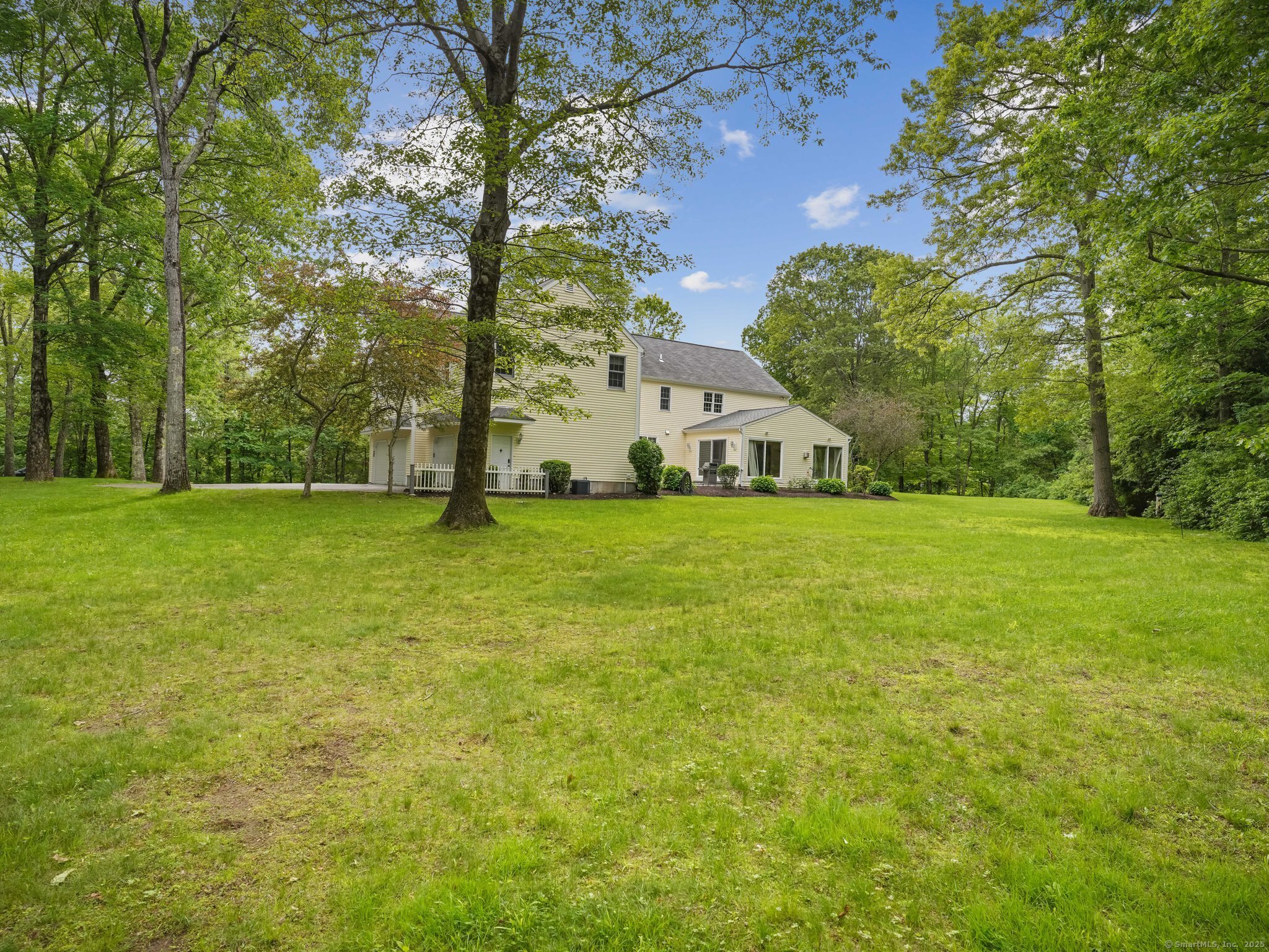 22 Fox Run Wilton, CT 06897 - Photo 8 of 40 a view of a field of grass and trees