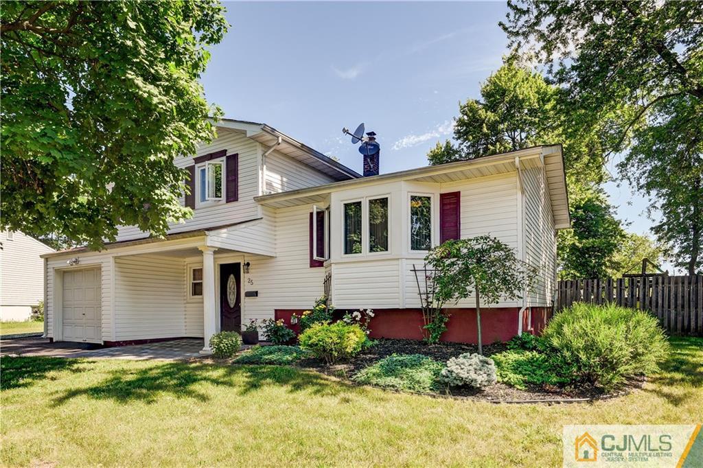 25 Outcalt Road Edison, NJ 08817 - Photo 1 of 1 a house view with a garden space