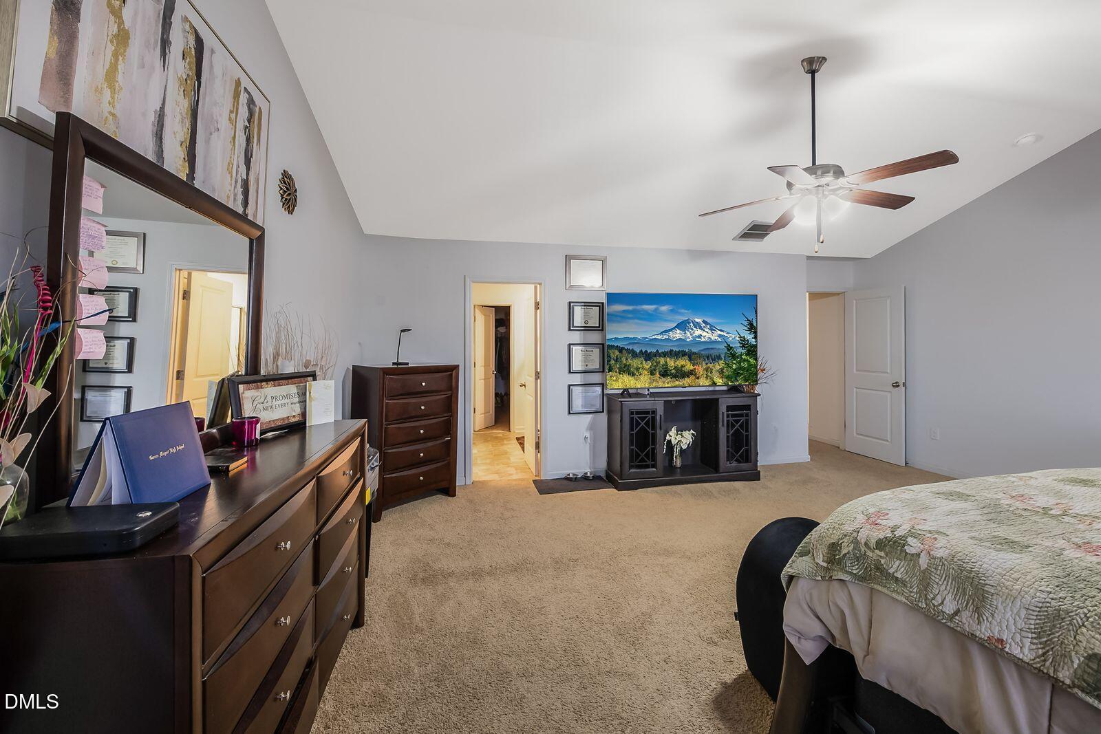 67 Prairie Street Clayton, NC 27527 - Photo 17 of 20 a living room with furniture and fireplace