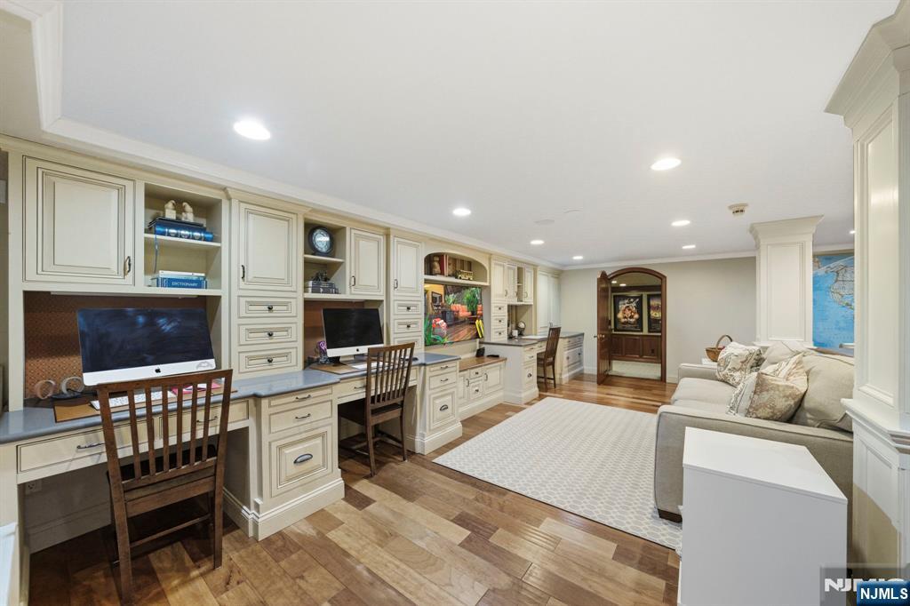 203 Heights Road Ridgewood, NJ 07450 - Photo 30 of 41 a large living room with stainless steel appliances furniture a rug and a kitchen view