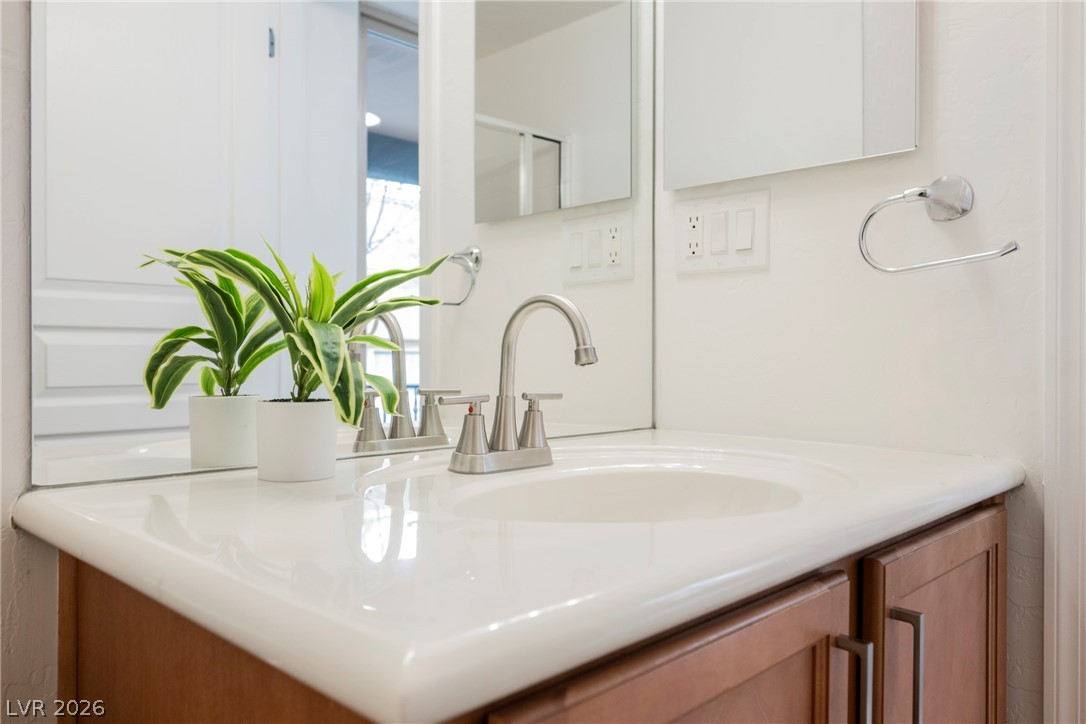 4650 Ranch House Road, Unit 64 North Las Vegas, NV 89031 - Photo 12 of 39 This clean and inviting bathroom features a well-maintained vanity with a simple, functional faucet.