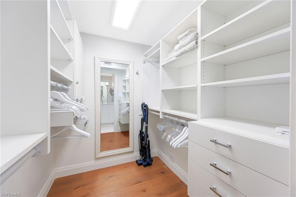 250 7th Avenue South, Unit 207 Naples, FL 34102 - Photo 12 of 25 Walk-in Master Closet