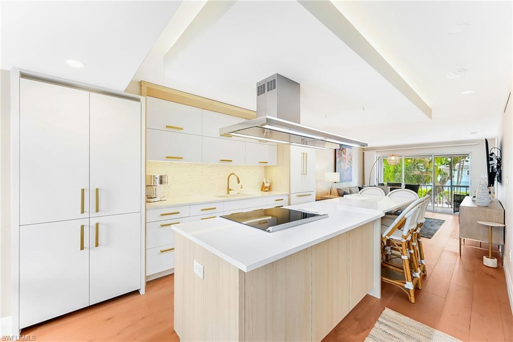 250 7th Avenue South, Unit 207 Naples, FL 34102 - Photo 5 of 25 Island kitchen