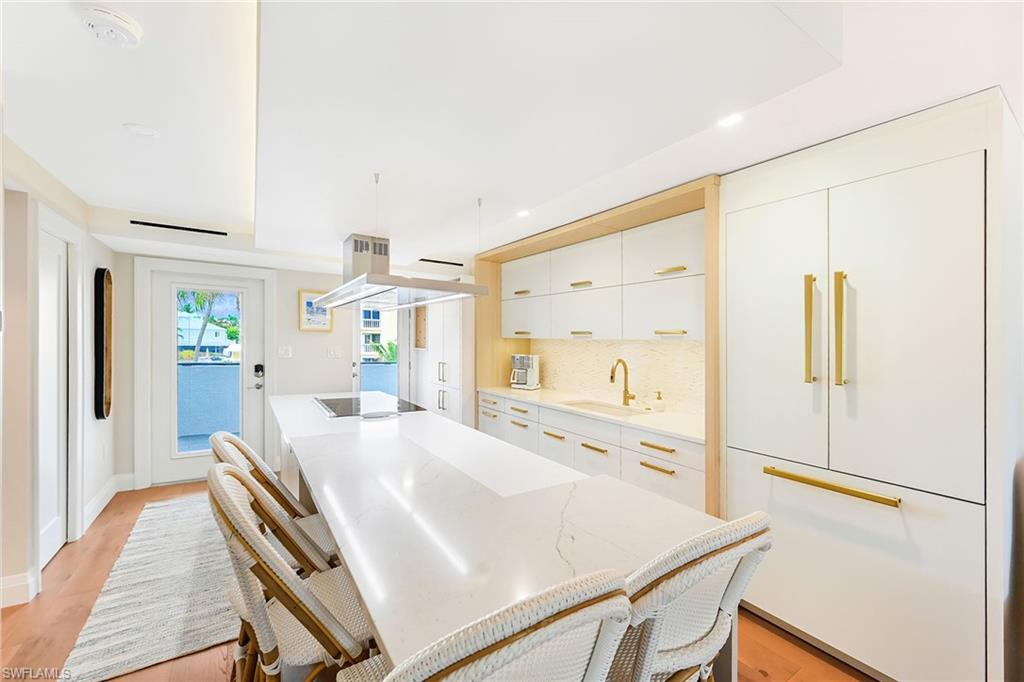 250 7th Avenue South, Unit 207 Naples, FL 34102 - Photo 7 of 25 Counter seating in kitchen