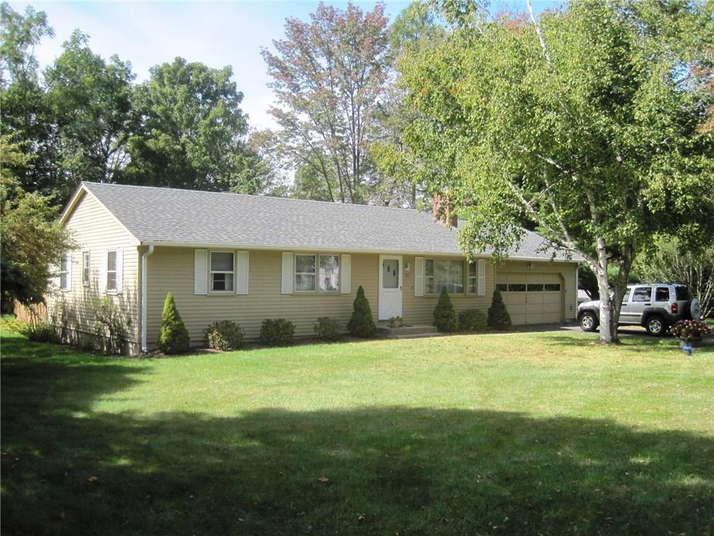 107 Canal Road Granby, CT 06035 - Photo 1 of 1 a view of a house with a yard and sitting area