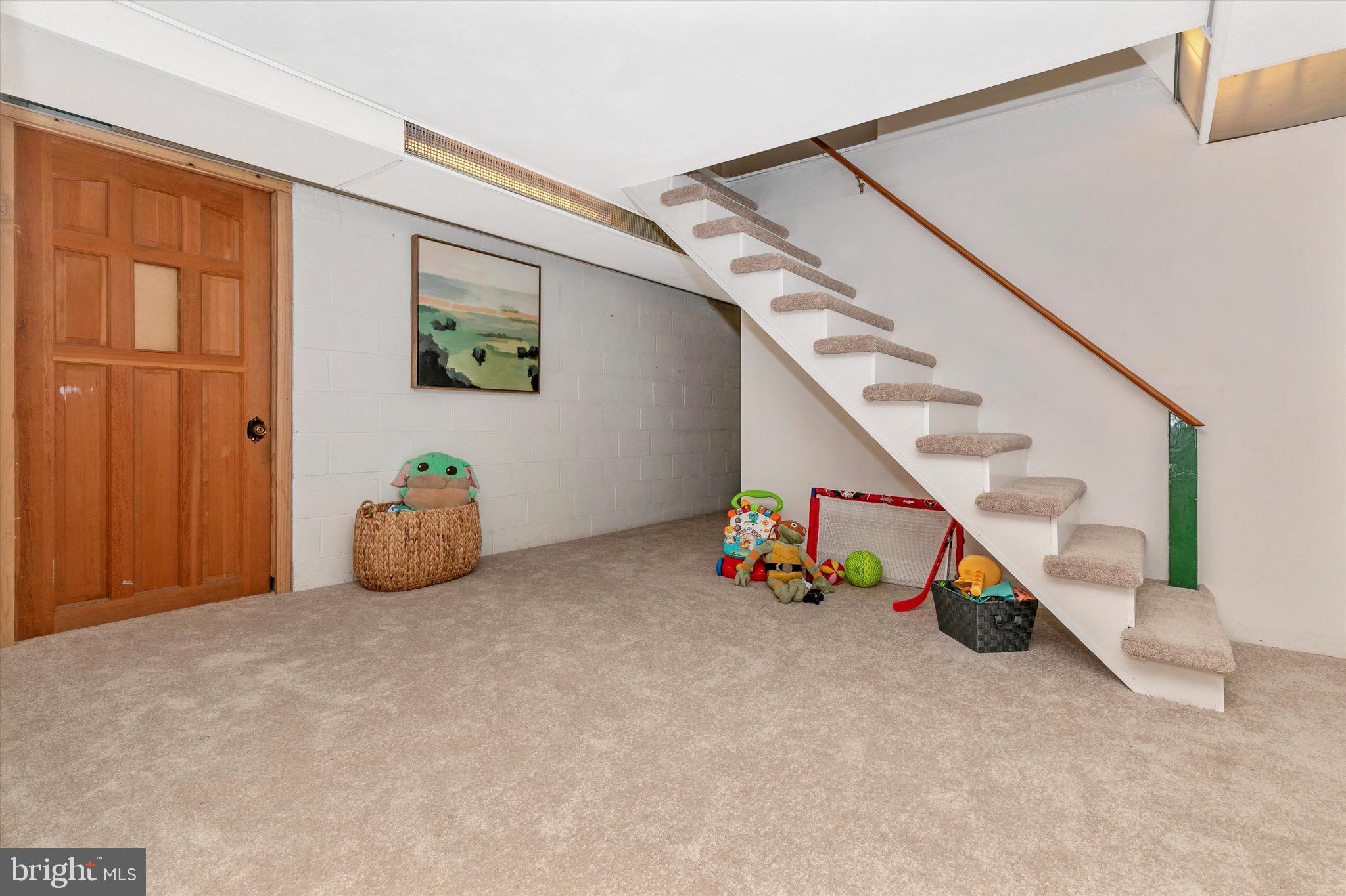 7023 Ridge Road Frederick, MD 21702 - Photo 42 of 65 Play Area and Door Leading to Workshop
