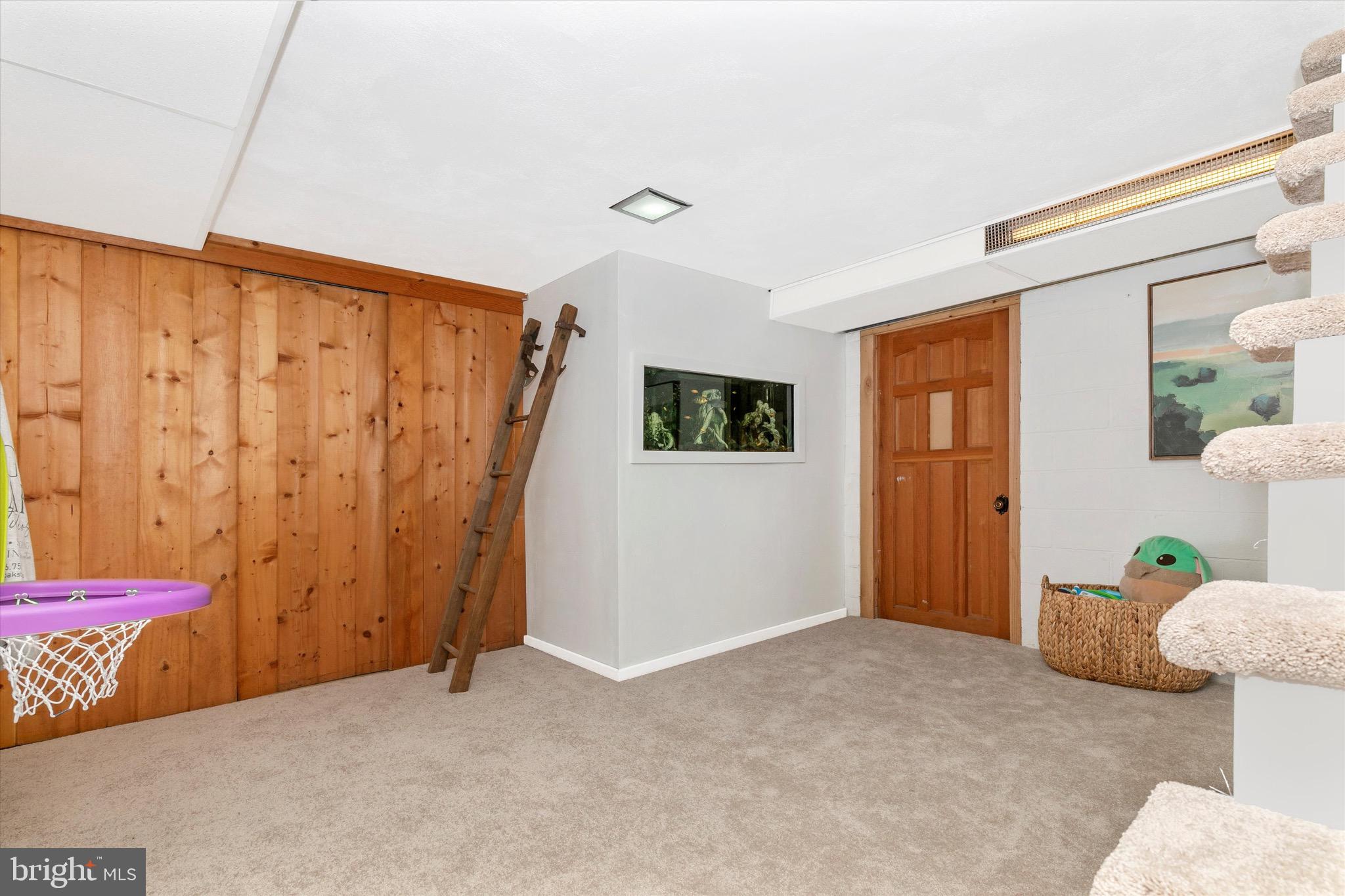 7023 Ridge Road Frederick, MD 21702 - Photo 43 of 65 Basement Foyer and Doors to Laundry/Storage Area