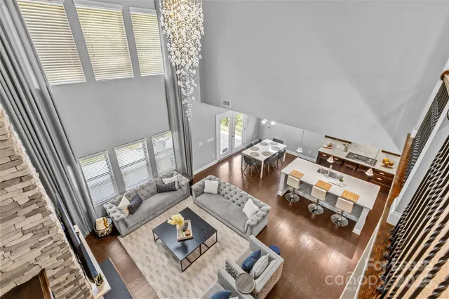 a bed sitting in a room next to a window