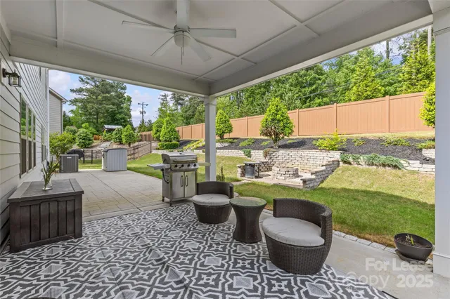 a view of a house with outdoor seating