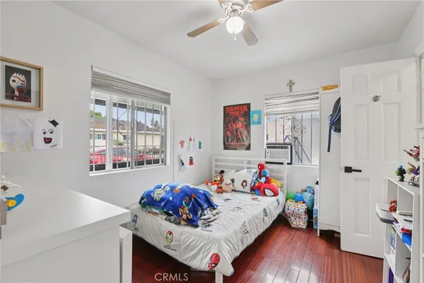 a room with furniture and a wooden floor