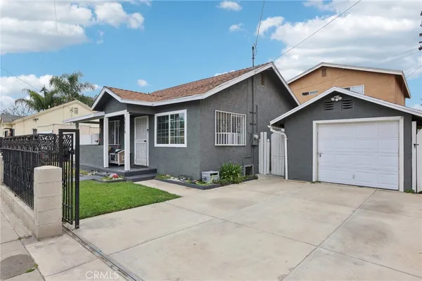 a front view of a house with yard