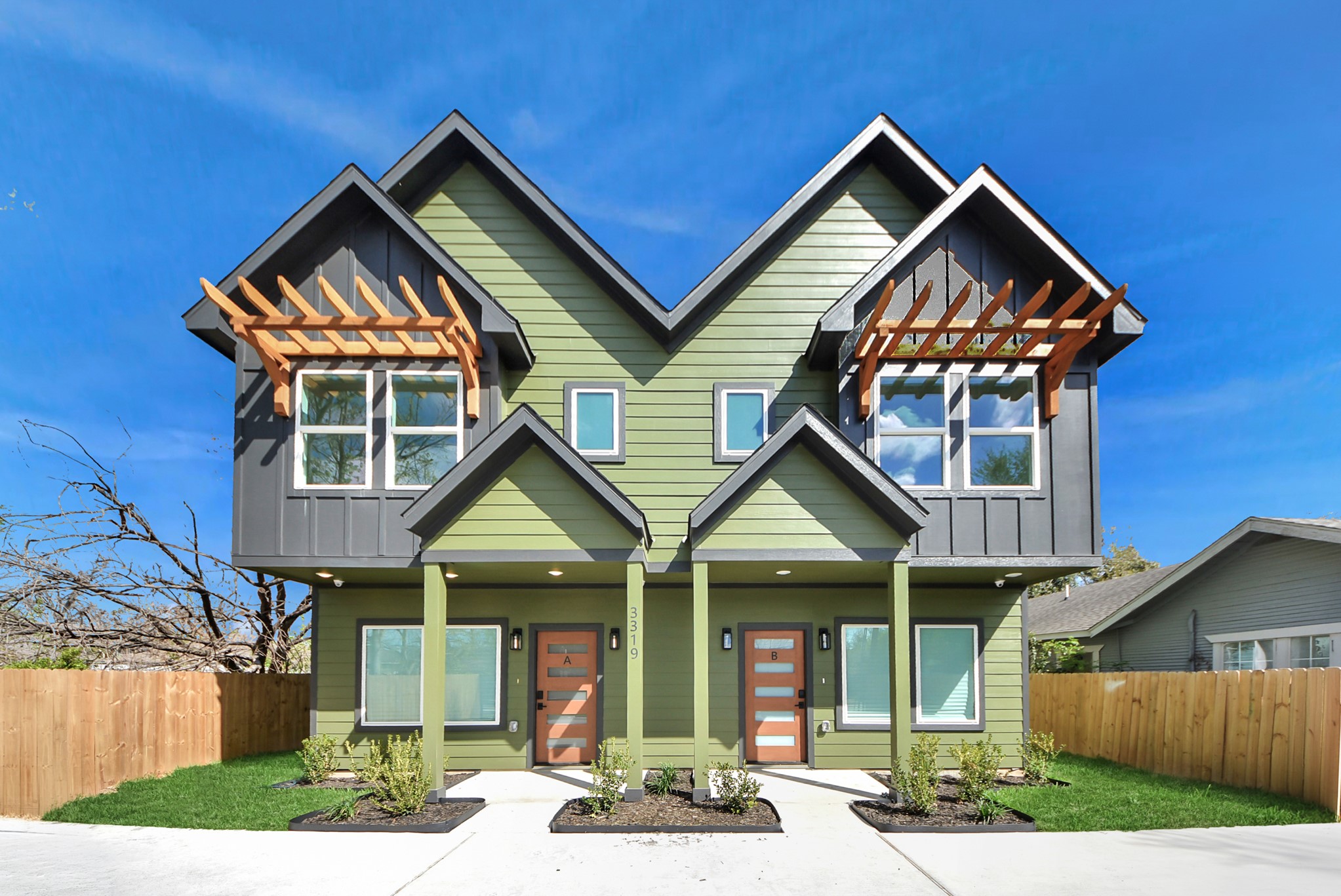 3319 Caplin Street Houston, TX 77026 - Photo 2 of 42 a front view of a house with porch
