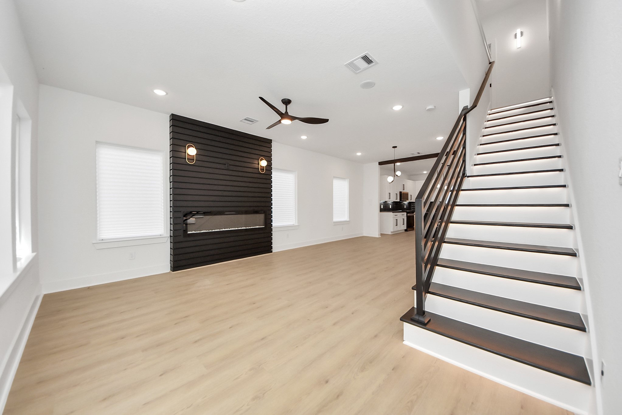3319 Caplin Street Houston, TX 77026 - Photo 3 of 42 a view of a room with stairs and a window