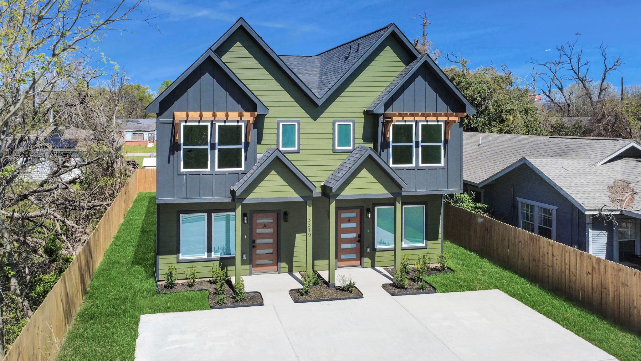 3319 Caplin Street Houston, TX 77026 - Photo 38 of 42 a front view of a house with a yard