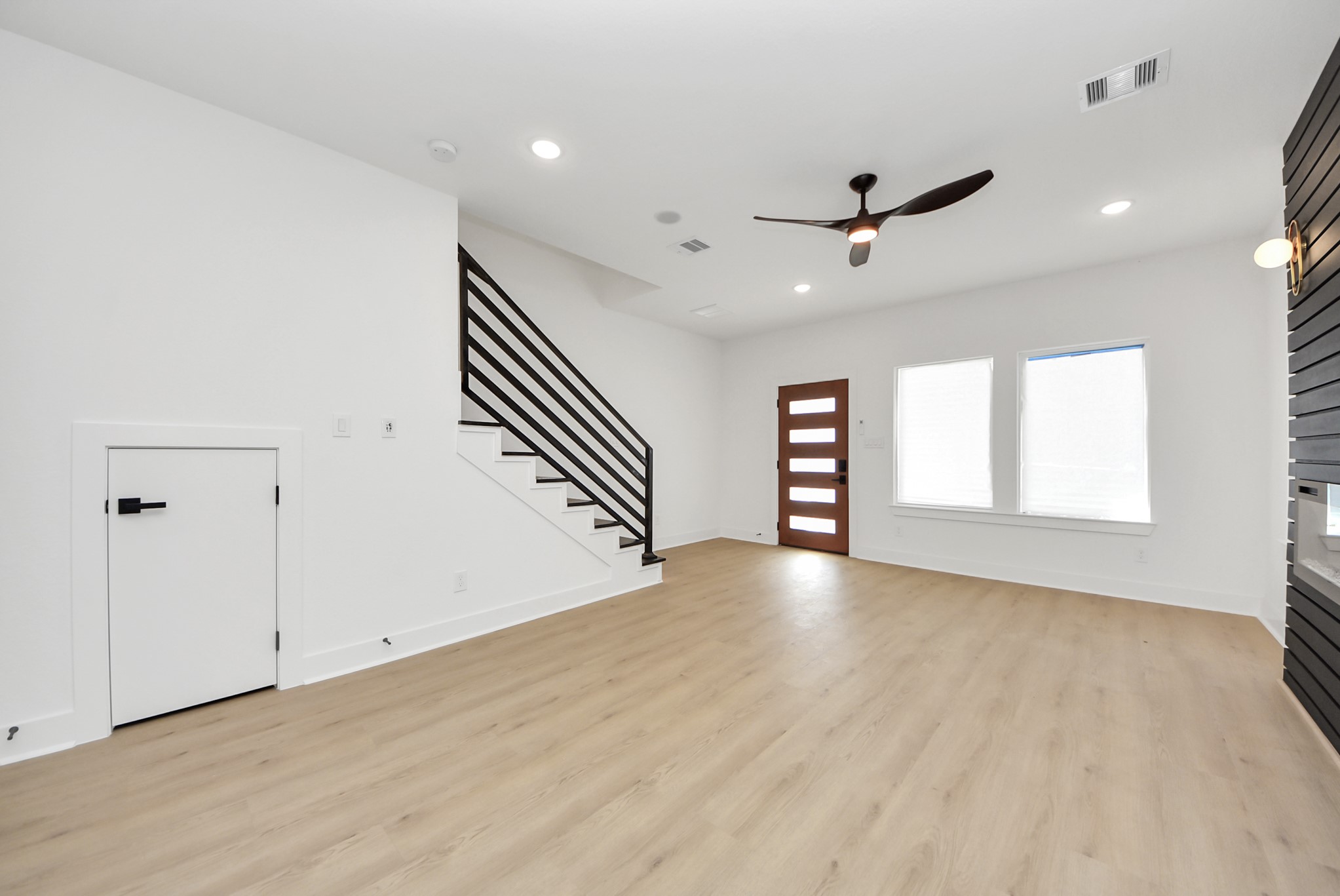 3319 Caplin Street Houston, TX 77026 - Photo 6 of 42 wooden floor in an empty room with a window