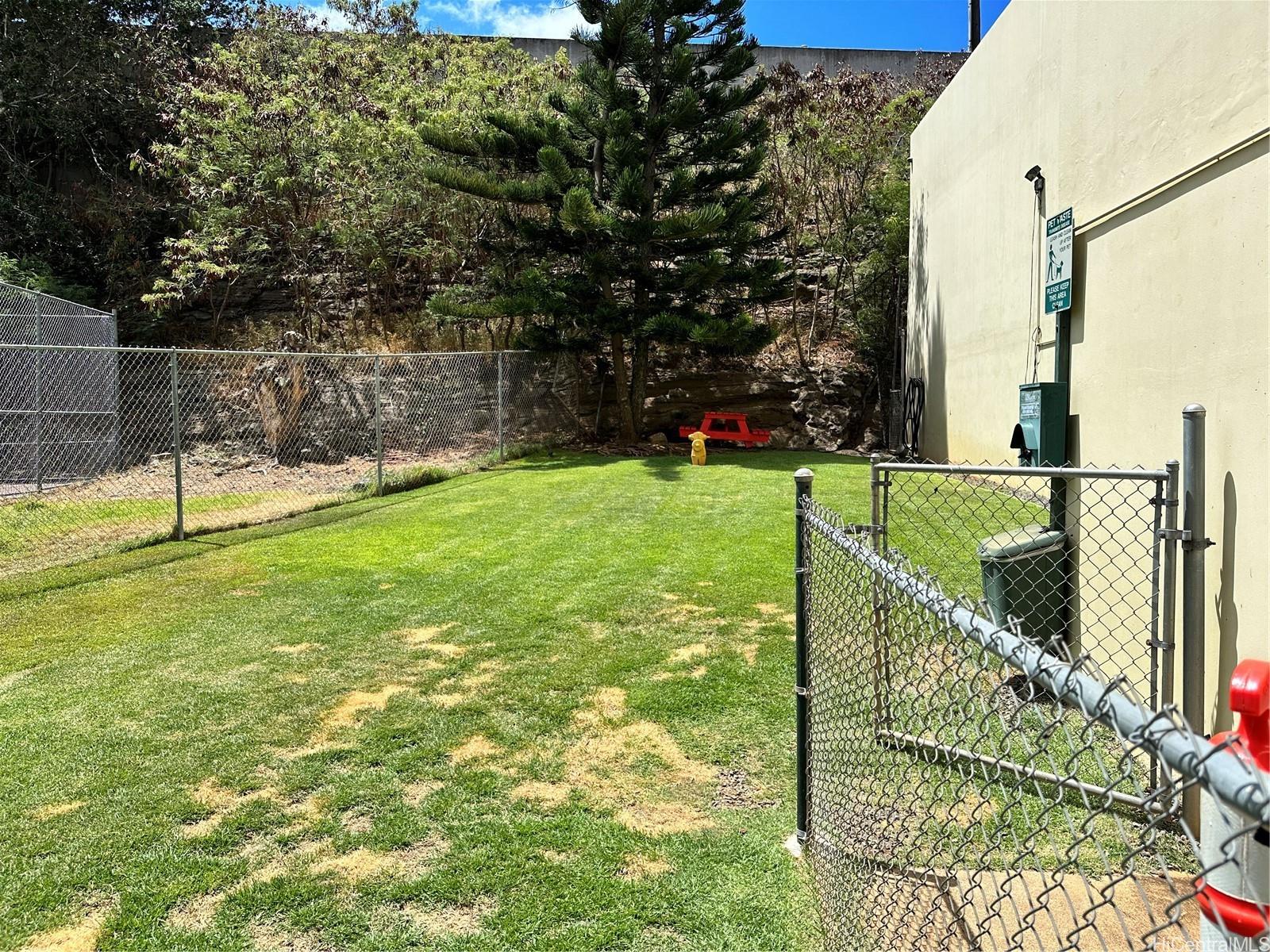 3161 Ala Ilima Street, Unit 903 Honolulu, HI 96818 - Photo 11 of 15 a view of a park with iron fence
