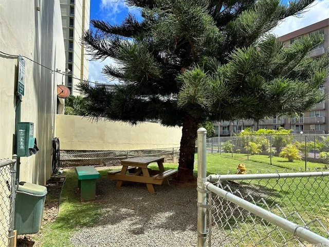 a view of swimming pool with a patio