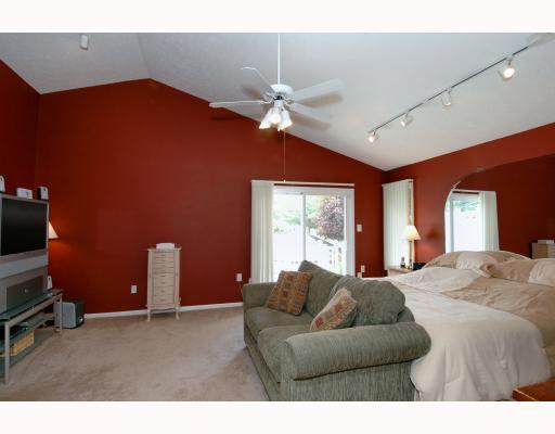 10280 Grubbs Road Wexford, PA 15090 - Photo 10 of 18 Master Bedroom. The master suite features, paddle fan, vaulted ceiling, neutral carpeting, slider to deck