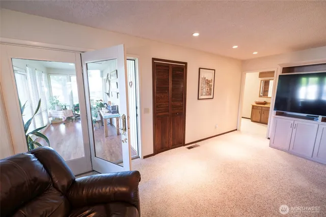 a workspace with a computer on a desk and chair