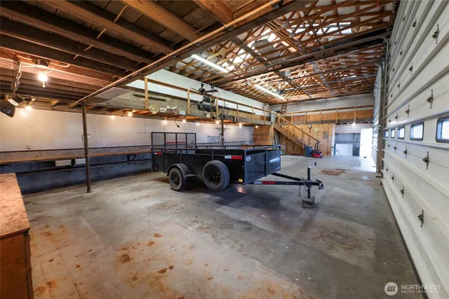 a view of outdoor space with green field and trees