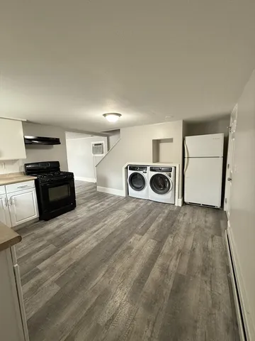 a view of kitchen and a sink