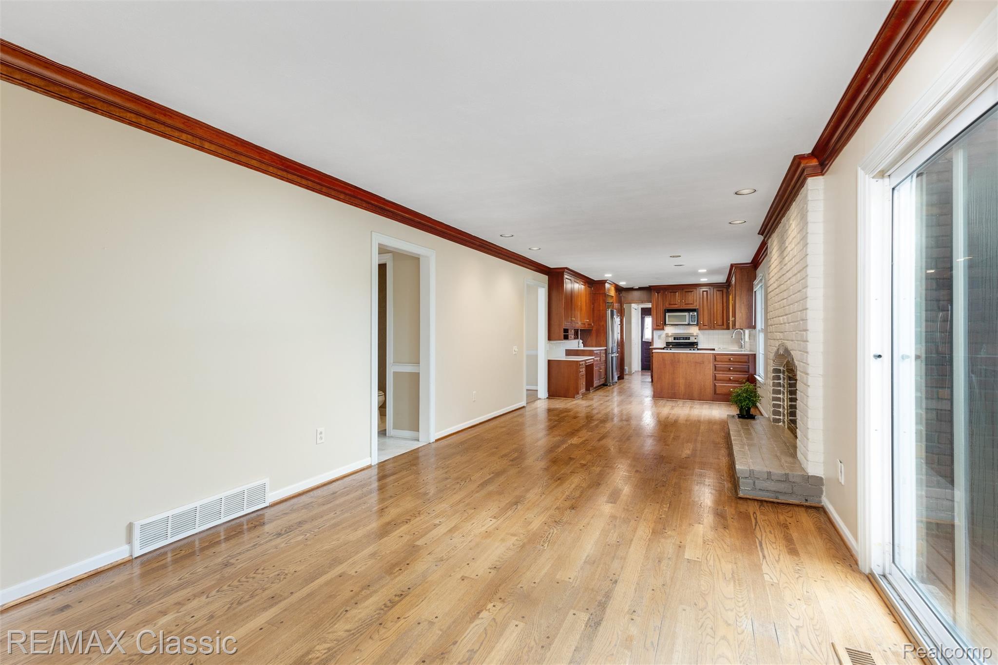 4268 Covered Bridge Road Bloomfield Hills, MI 48302 - Photo 5 of 35 Hardwood flooring throughout the main living area