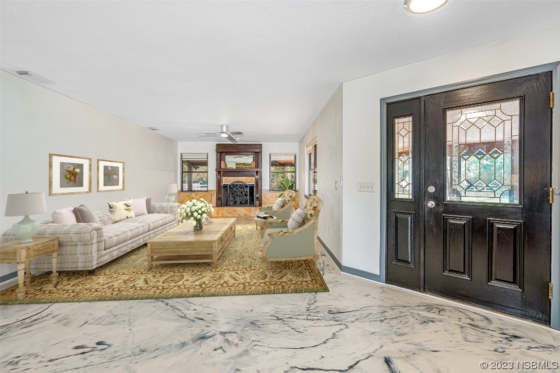 Undisclosed Address Edgewater, FL 32141 - Photo 14 of 37 a living room with furniture window and wooden floor