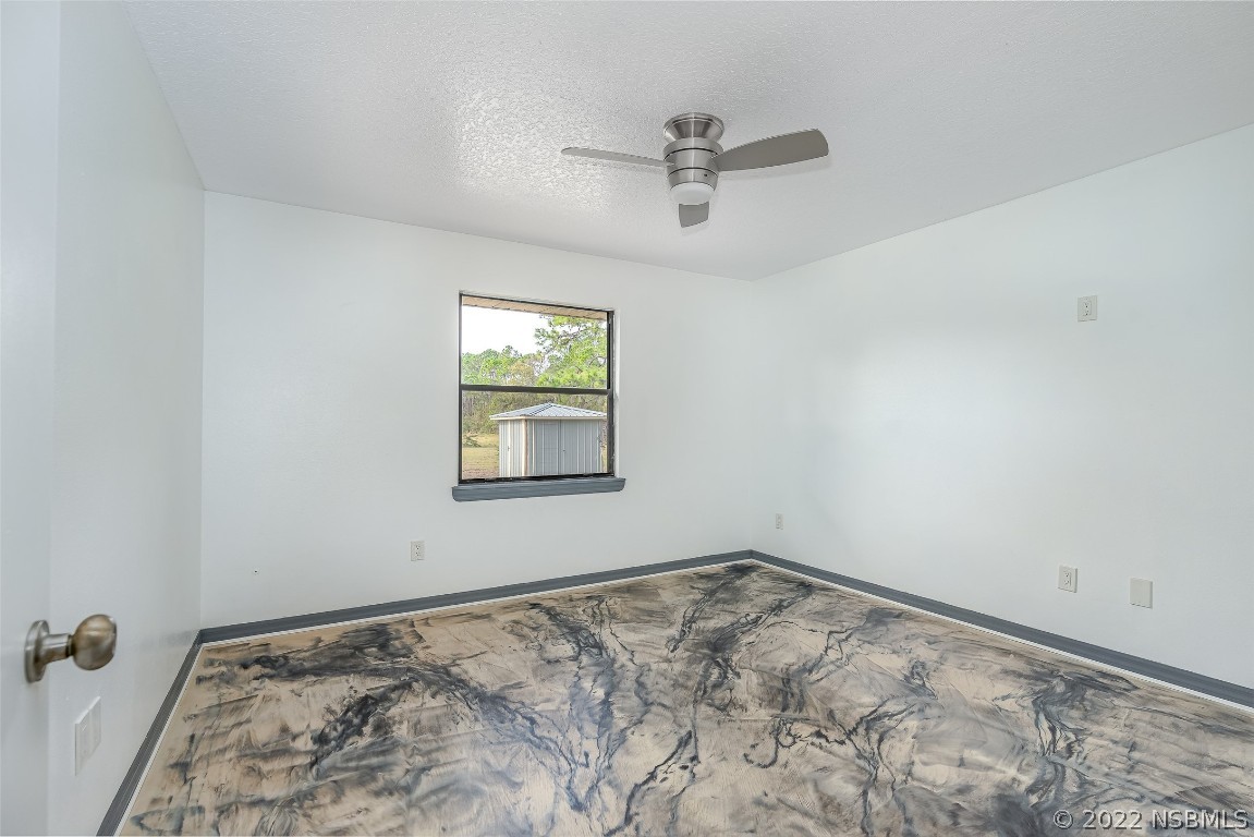 Undisclosed Address Edgewater, FL 32141 - Photo 20 of 37 a view of a room with a window
