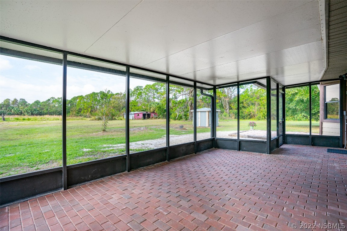 Undisclosed Address Edgewater, FL 32141 - Photo 31 of 37 a view of an empty room with a large window