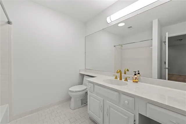 a bathroom with a sink and a toilet