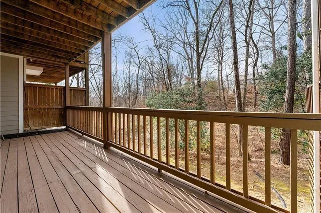a view of balcony with wooden floor