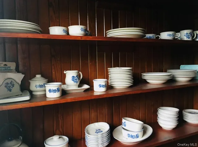 a kitchen with a table and chairs