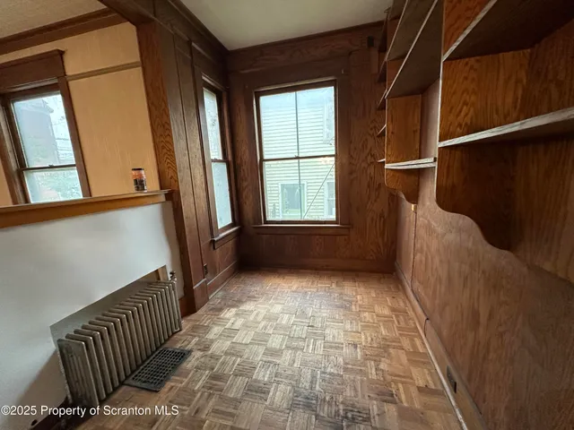 a room with window and couch