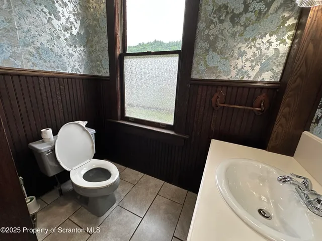 a bathroom with a sink and a toilet