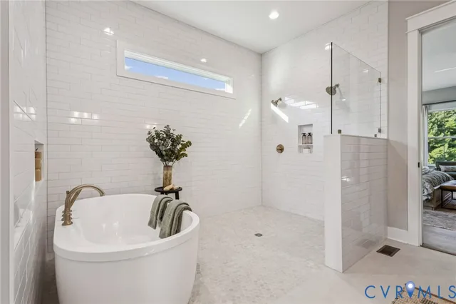 a bathroom with a sink a shower and a mirror