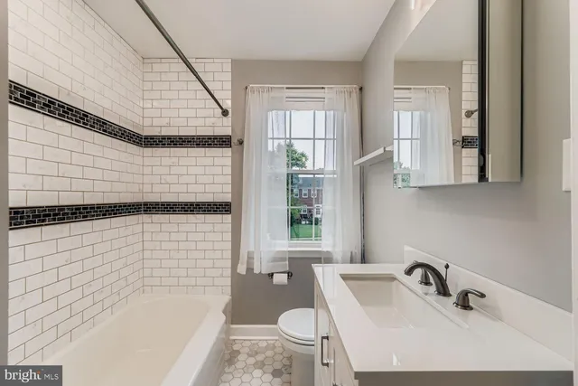 a bathroom with a sink and a bathtub