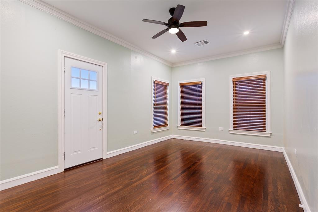 2600 Maple Avenue Waco, TX 76707 - Photo 22 of 28 a view of an empty room with wooden floor and a window