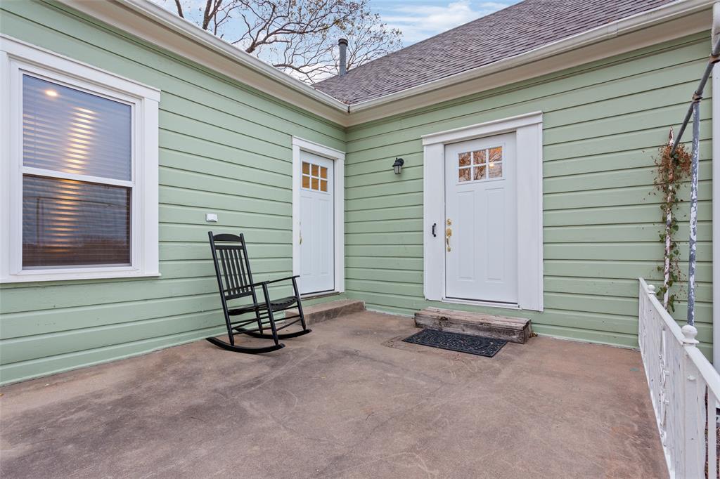 2600 Maple Avenue Waco, TX 76707 - Photo 26 of 28 a view of a backyard with a chair and a barbeque