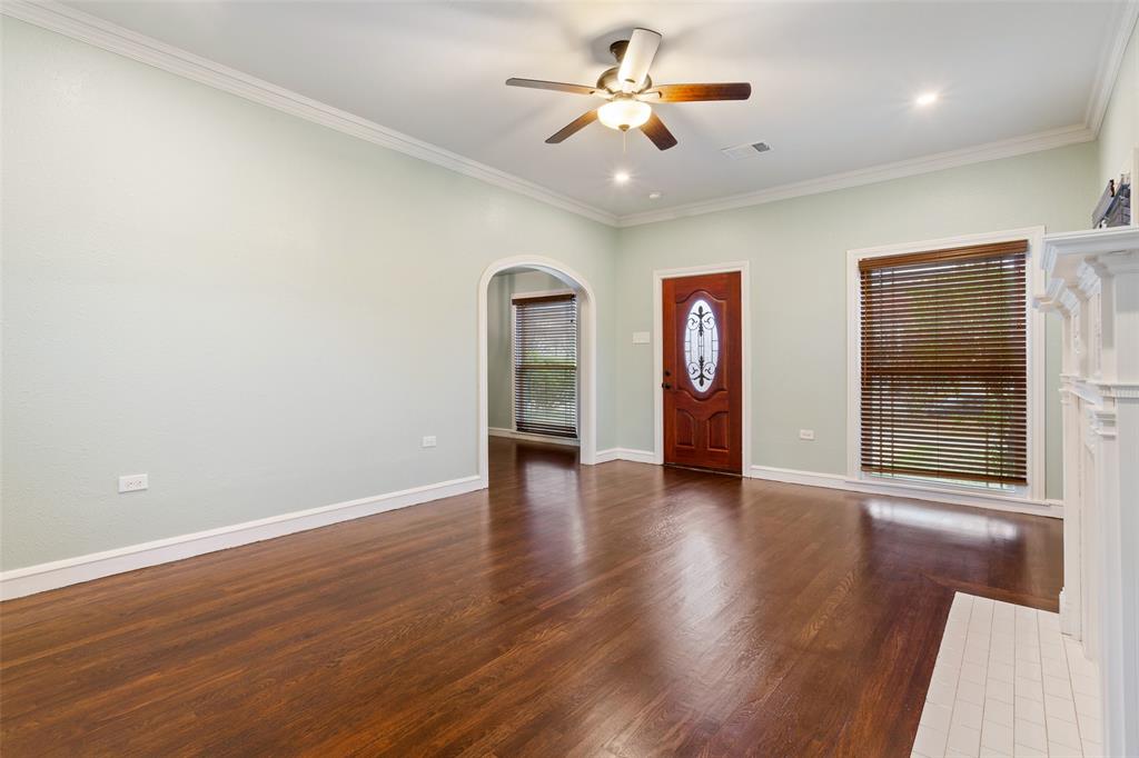 2600 Maple Avenue Waco, TX 76707 - Photo 8 of 28 wooden floor in an empty room with a window