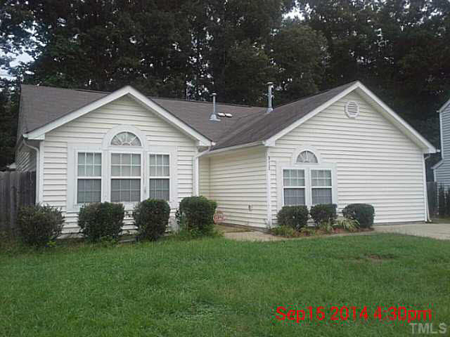 3117 Mango Drive Raleigh, NC 27610 - Photo 2 of 6 a view of a house with backyard
